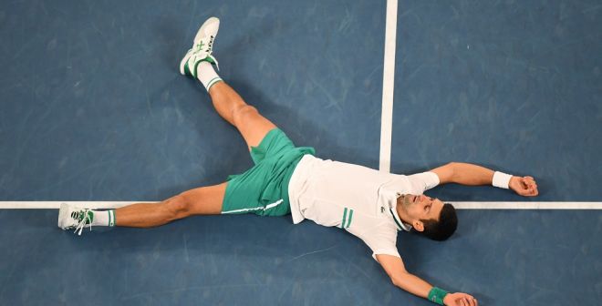Novak Djokovic celebrates his Australian Open win to start the year